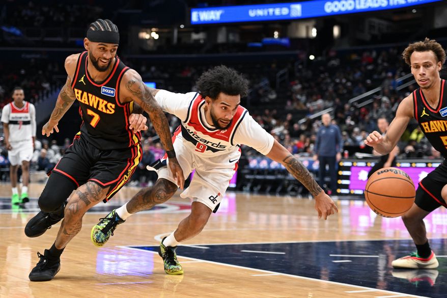Washington Wizards forward Justin Champagnie (9) chasing after a loose ball during the third quarter of an NBA game against the Atlanta Hawks at Capital One Arena in Washington D.C., December 6, 2025. (Photo for the Washington Times)