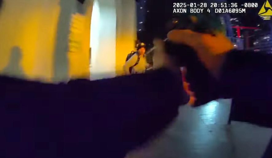This photo, taken from a body-worn camera video, shows the moment before a San Diego Police Officer fatally shot 16-year-old Konoa Wilson as he ran away from gunfire on Jan. 28, 2025. (San Diego Police Department via AP)