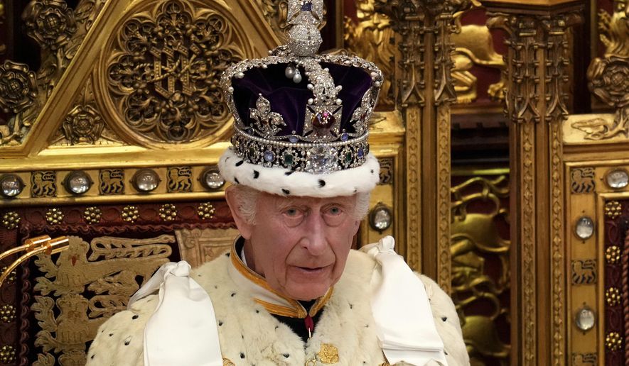 King Charles III wearing the Crown Jewels attends the State Opening of Parliament in the House of Lords, London, Wednesday, July 17, 2024. (AP Photo/Kirsty Wigglesworth, Pool File)