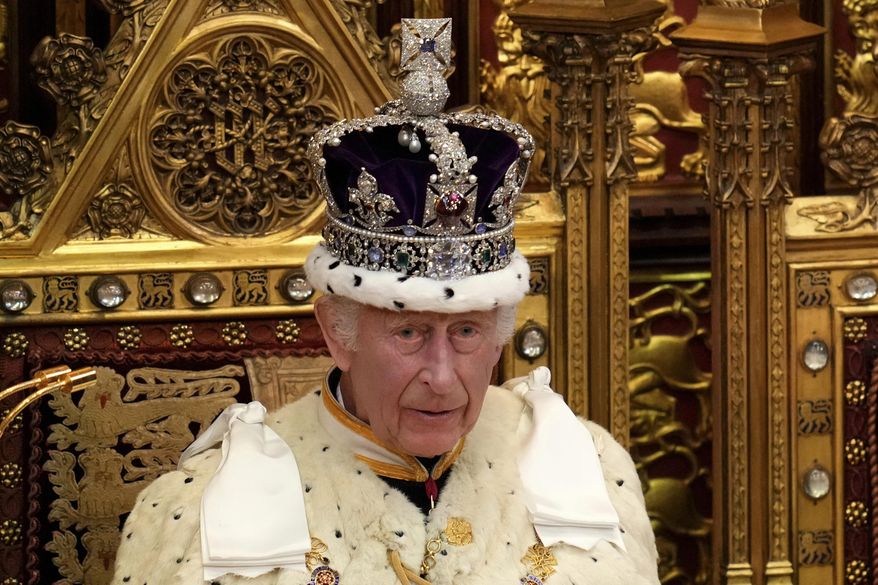 King Charles III wearing the Crown Jewels attends the State Opening of Parliament in the House of Lords, London, Wednesday, July 17, 2024. (AP Photo/Kirsty Wigglesworth, Pool File)