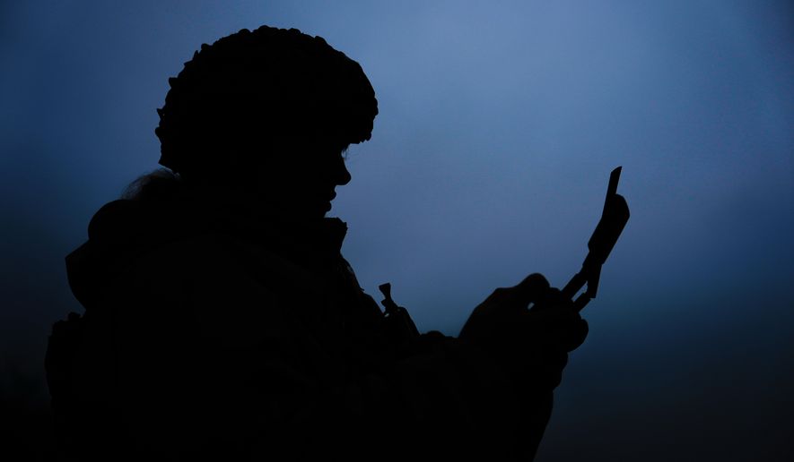 A Ukrainian drone operator from the Kraken 1654 unit, callsign Imla, flies a Vampire drone during a demonstration for The Associated Press, Wednesday, Nov. 5, 2025, in Kharkiv Oblast, Ukraine. (AP Photo/Julia Demaree Nikhinson)