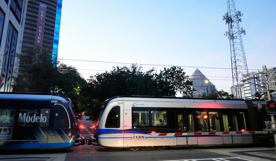FILE - A Charlotte Area Transit System light rail departs a station, Sept. 8, 2025, in Charlotte, N.C. (AP Photo/Erik Verduzco, File)