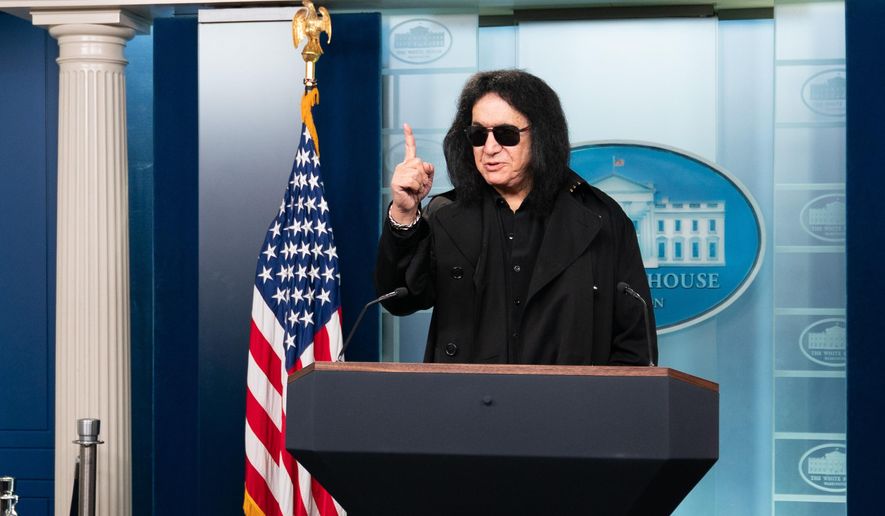 Kiss band member Gene Simmons speaks to members of the media at the White House, Friday, Dec. 5, 2025, in Washington. (AP Photo/Allison Robbert)