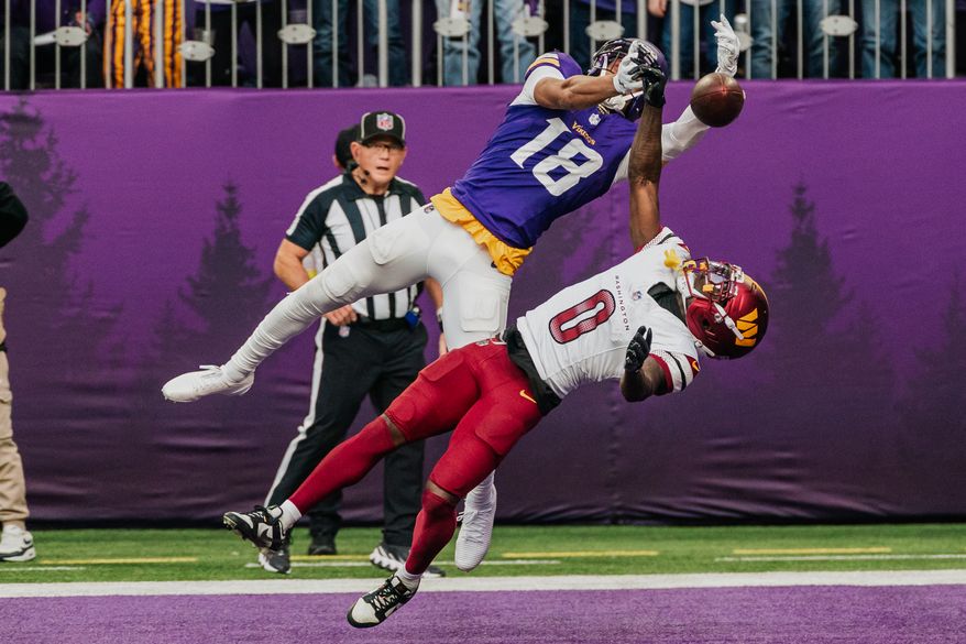 Washington Commanders Defensive Back Mikey Sainristil (0) stops Minnesota Vikings Wide Receiver Justin Jefferson (18) from catching touch down pass at U.S. Bank Stadium in Minneapolis, Minnesota. The Minnesota Vikings defeated the Washington Commanders 31-0 during NFL Week 14 on December 7th, 2025. (Photo by Jordan Sabillo for Washington Times)