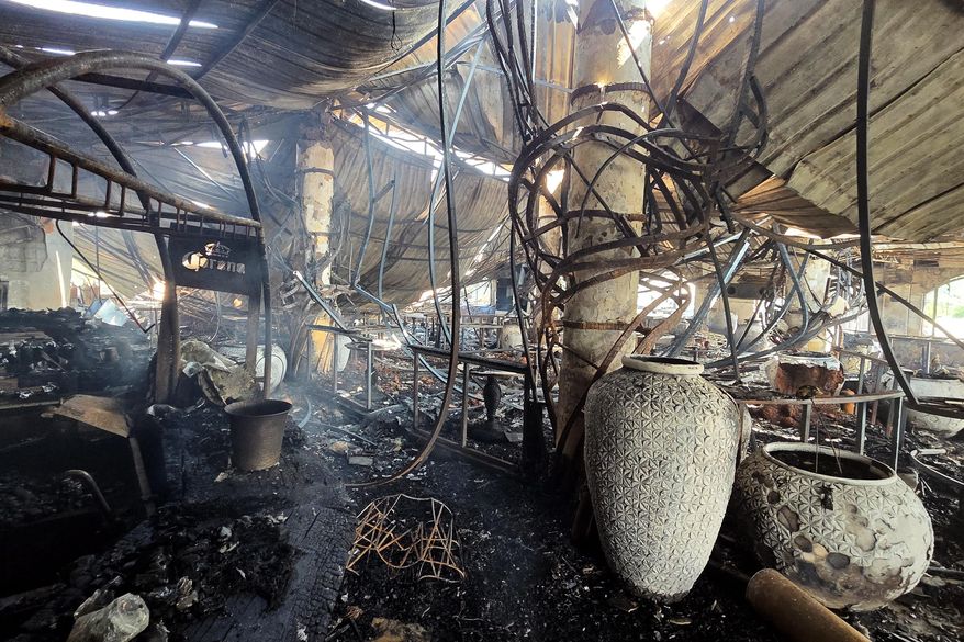The charred interior of a nightclub, which caught fire early Sunday, is seen in Arpora, in Goa, India, Sunday, Dec. 7, 2025. (AP Photo)