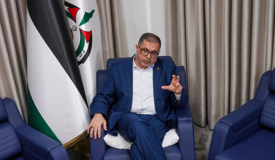 FILE - Bassem Naim, an official in Hamas' political wing, speaks in Istanbul, Turkey, Thursday, Dec. 5, 2024. (AP Photo/Francisco Seco, File)