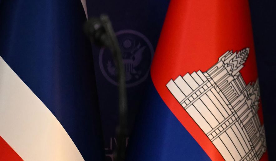 The flags of Thailand, left, and Cambodia, right, are seen ahead of the ceremonial signing of a ceasefire agreement between Thailand and Cambodia on the sidelines of the 47th Association of Southeast Asian Nations (ASEAN) summit in Kuala Lumpur, Malaysia, Sunday, Oct. 26, 2025. (Mohd Rasfan/Pool Photo via AP, File)