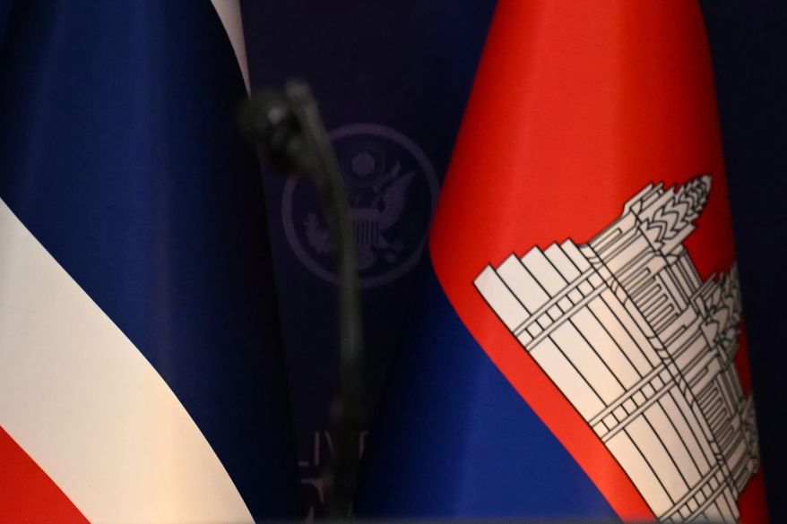 The flags of Thailand, left, and Cambodia, right, are seen ahead of the ceremonial signing of a ceasefire agreement between Thailand and Cambodia on the sidelines of the 47th Association of Southeast Asian Nations (ASEAN) summit in Kuala Lumpur, Malaysia, Sunday, Oct. 26, 2025. (Mohd Rasfan/Pool Photo via AP, File)