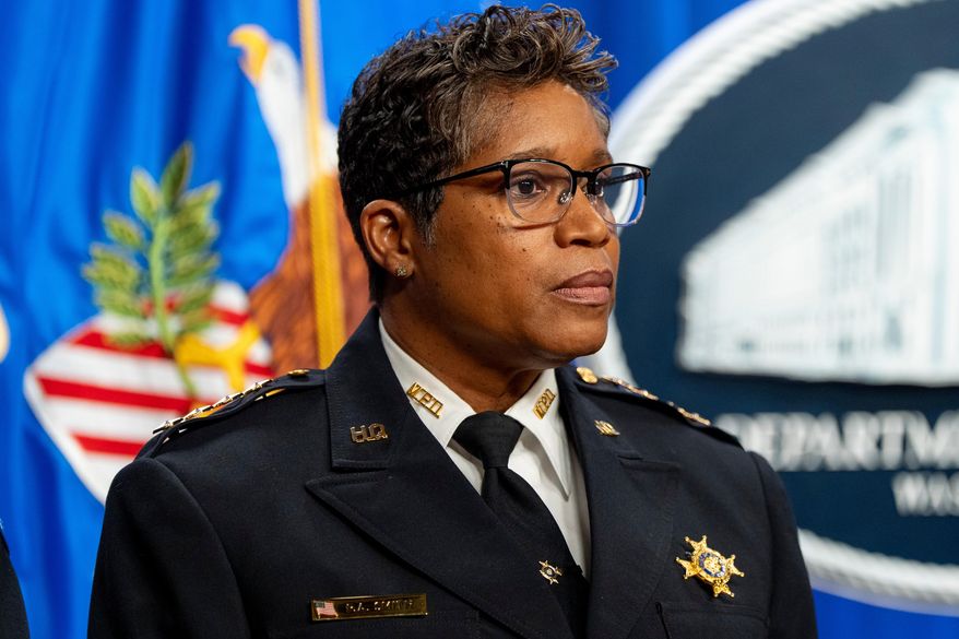 Washington Metropolitan Police Chief Pamela Smith stands during a news conference at the Department of Justice, Thursday, Dec. 4, 2025, in Washington. (AP Photo/Alex Brandon)