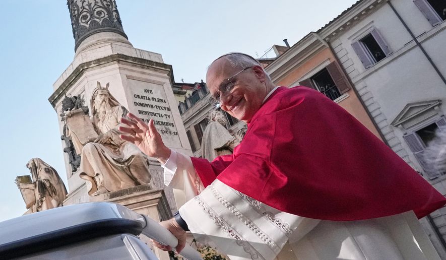 Pope Leo XIV leaves after praying in front of the statue of the Virgin Mary next to the Spanish Steps in Rome, Monday, Dec. 8, 2025, on the Catholic Feast of the Immaculate Conception. (AP Photo/Andrew Medichini)