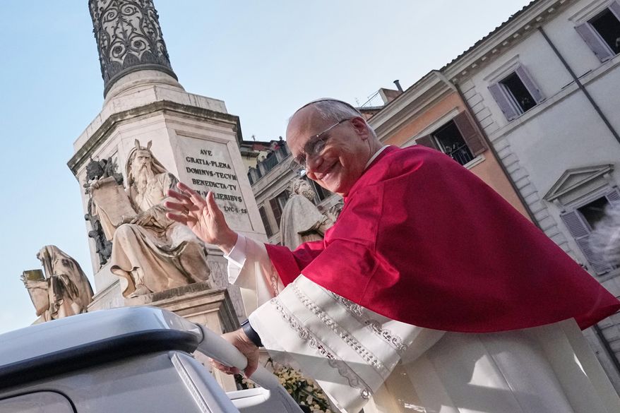 Pope Leo XIV leaves after praying in front of the statue of the Virgin Mary next to the Spanish Steps in Rome, Monday, Dec. 8, 2025, on the Catholic Feast of the Immaculate Conception. (AP Photo/Andrew Medichini)