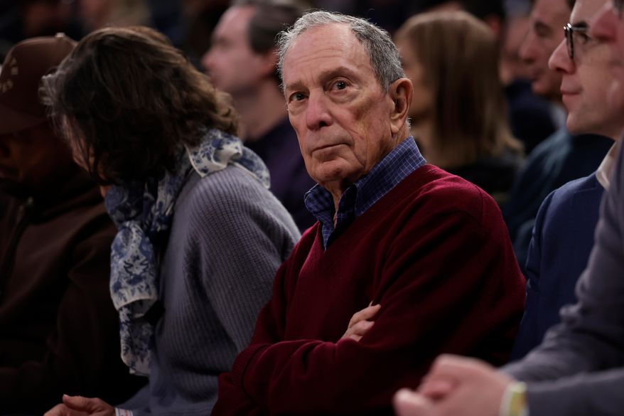 FILE - Michael Bloomberg looks on during the first half of an NBA basketball game between the LA Clippers and the New York Knicks Wednesday, March 26, 2025, in New York. (AP Photo/Adam Hunger, file)