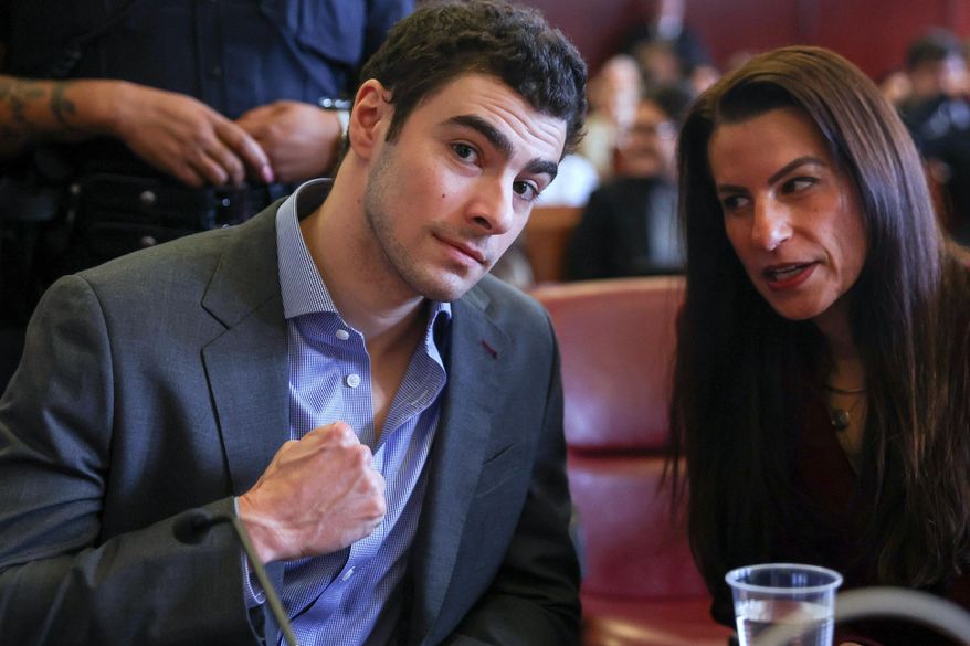 Luigi Mangione appears in Manhattan Criminal Court, Monday, Dec. 8, 2025, in New York. (Sarah Yenesel/Pool Photo via AP)