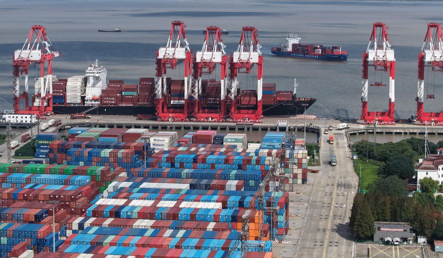 An aerial view of a container terminal in Shanghai, China, Monday, Dec. 8, 2025. (Chinatopix Via AP) ** FILE **