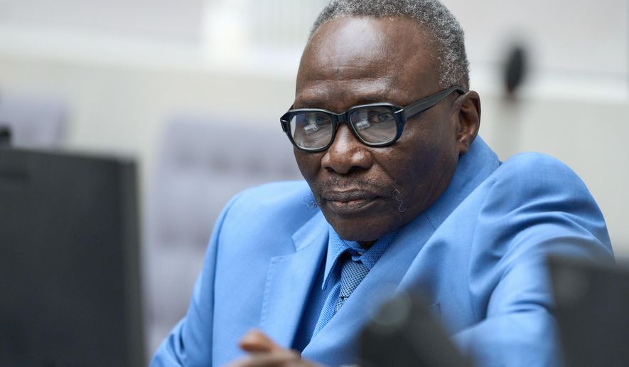 Ali Muhammad Ali Abd al-Rahman, a leader of the Sudanese Janjaweed militia, waits to hear the verdict of the International Criminal Court, ICC, in The Hague, Netherlands, Tuesday, Dec. 9, 2025. (AP Photo/Peter Dejong, Pool)