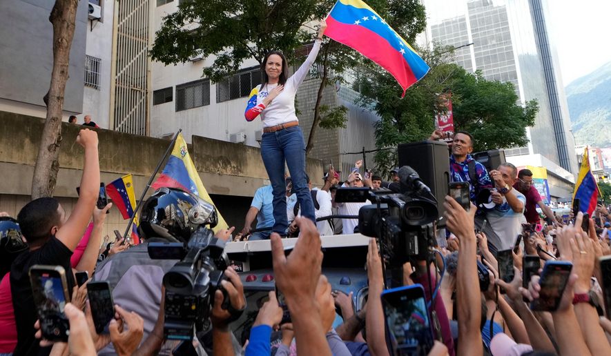 Venezuelan opposition leader Maria Corina Machado addresses supporters during a protest against President Nicolas Maduro the day before his inauguration for a third term in Caracas, Venezuela, Thursday, Jan. 9, 2025. (AP Photo/Matias Delacroix, File)