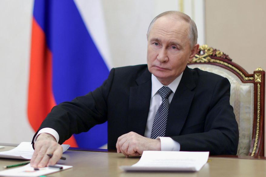 Russian President Vladimir Putin attends a meeting of the Presidential Council for the Development of Civil Society and Human Rights via videoconference at the Kremlin in Moscow, on Tuesday, Dec. 9, 2025. (Gavriil Grigorov, Sputnik, Kremlin Pool Photo via AP)