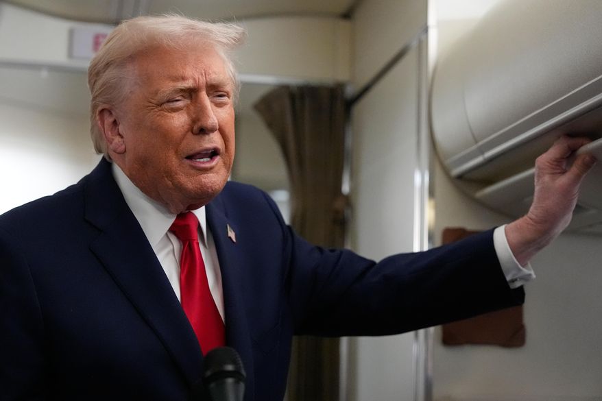 President Donald Trump speaks with reporters while in flight on Air Force One from Joint Base Andrews to Avoca, Pa., Tuesday, Dec. 9, 2025. (AP Photo/Alex Brandon)
