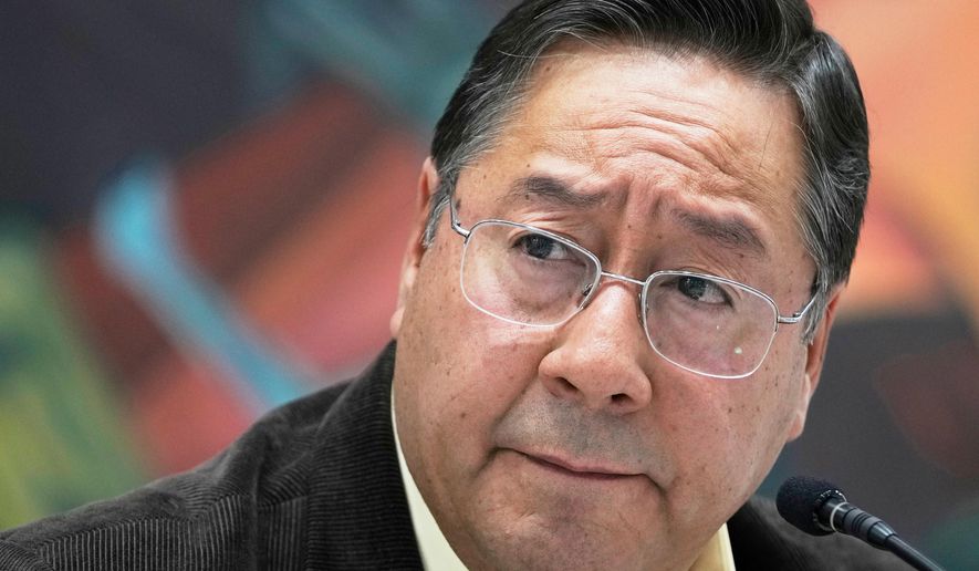 Bolivia's President Luis Arce listens to questions during a press conference at the presidential palace in La Paz, Bolivia, Aug. 21, 2025. (AP Photo/Juan Karita, File)