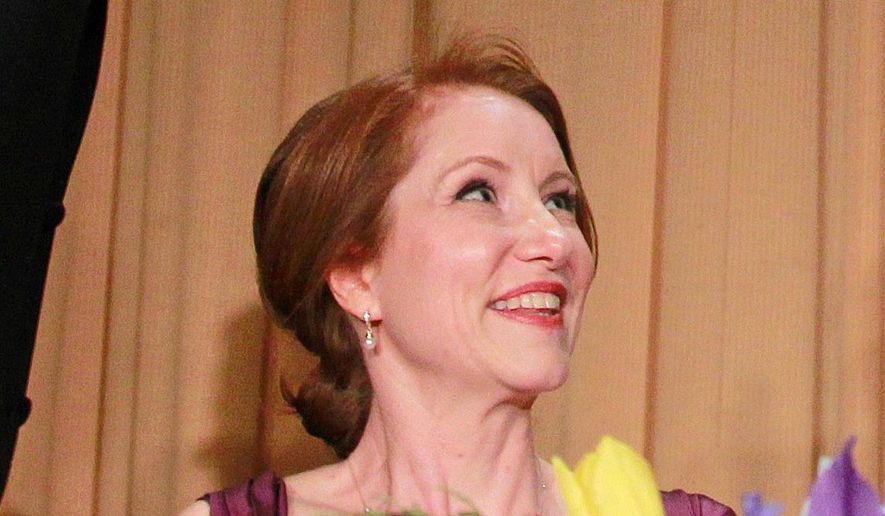 Caren Bohan attends the White House Correspondents' Association Dinner, April 28, 2012, in Washington. (AP Photo/Haraz N. Ghanbari, File)