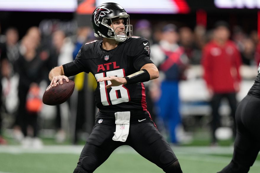 Atlanta Falcons quarterback Kirk Cousins throws against the Seattle Seahawks during the first half of an NFL football game, Sunday, Dec. 7, 2025, in Atlanta. (AP Photo/Brynn Anderson)