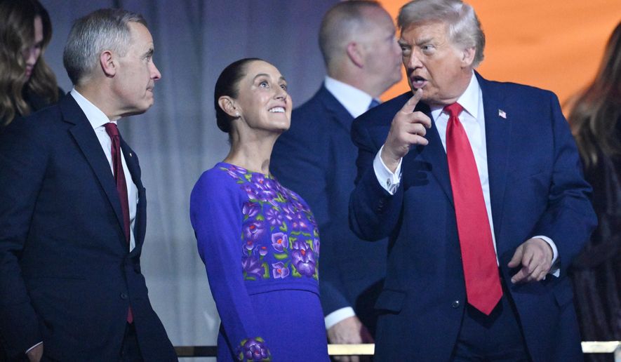 President Donald Trump speaks with Canadian Prime Minister Mark Carney and Mexican President Claudia Sheinbaum after the draw for the 2026 soccer World Cup at the Kennedy Center in Washington, Friday, Dec. 5, 2025. (Mandel Ngan/Pool Photo via AP)