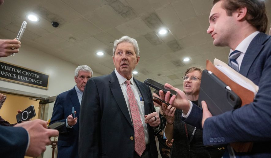 Sen. John Kennedy, R-La., speaks to reporters at the Senate Subway stakeout, Thursday, Dec. 4, 2025 in Washington. (AP Photo/Kevin Wolf)