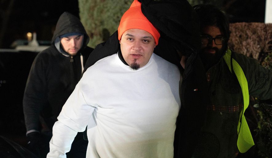 Kilmar Abrego García arrives to his home in Beltsville, Md., Thursday, Dec. 11, 2025, after being released from ICE custody. (AP Photo/Jose Luis Magana)