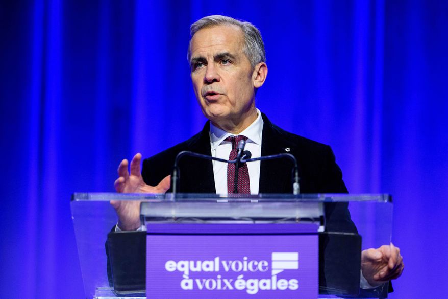 Canada Prime Minister Mark Carney delivers remarks during the annual Equal Voice gala in Ottawa, Ontario, Wednesday, Dec. 10, 2025. (Spencer Colby/The Canadian Press via AP)