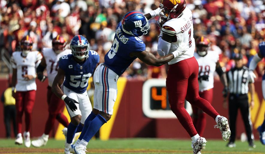 FILE - Washington Commanders wide receiver Deebo Samuel (1) catches the ball during an NFL football game against the New York Giants, on Sept. 7, 2025, in Landover. (AP Photo/Daniel Kucin Jr., File)