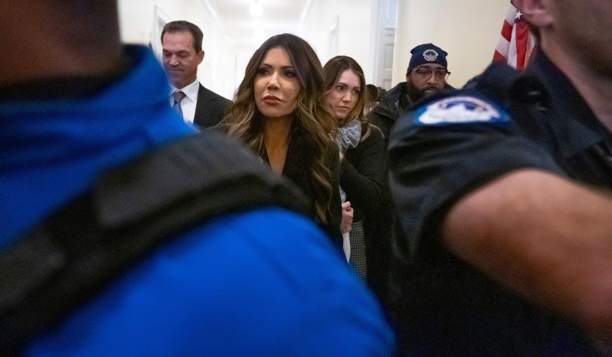 Homeland Security Secretary Kristi Noem leaves a hearing of the House Committee on Homeland Security on Capitol Hill in Washington, Thursday, Dec. 11, 2025. (AP Photo/Mark Schiefelbein)