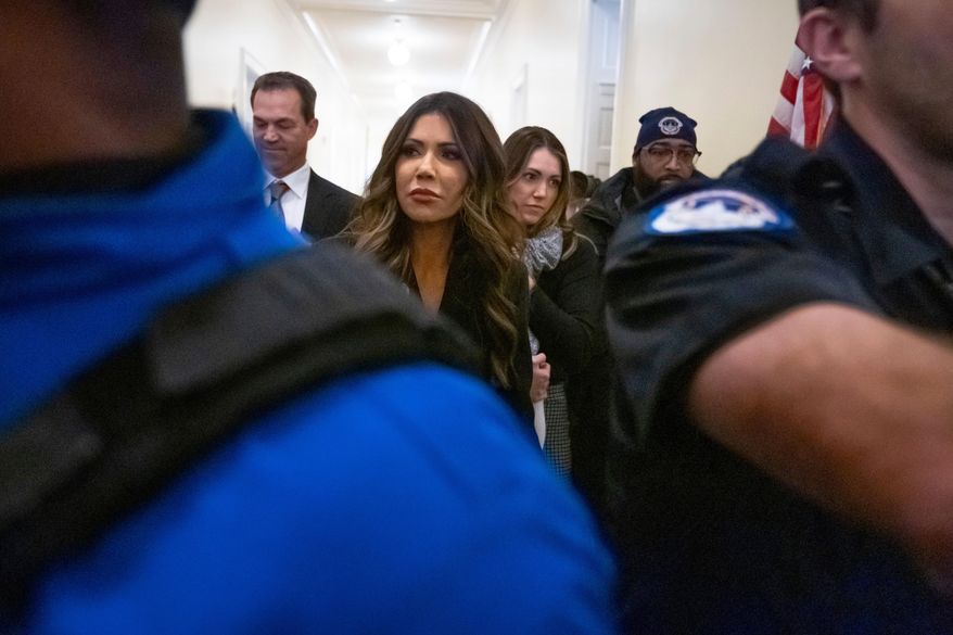Homeland Security Secretary Kristi Noem leaves a hearing of the House Committee on Homeland Security on Capitol Hill in Washington, Thursday, Dec. 11, 2025. (AP Photo/Mark Schiefelbein)