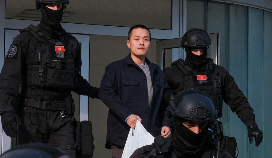 Montenegrin police officers escort South Korean citizen, Terraform Labs founder Do Kwon in Montenegro's capital Podgorica, March 23, 2024. (AP Photo/Risto Bozovic, File)