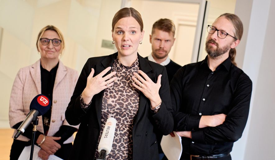 Danish Minister for Digitalization Caroline Stage and representatives from the agreement parties attend a press conference about a new political agreement for better protection of children and young people online, in Copenhagen, on Friday, Nov. 7, 2025. (Thomas Traasdahl/Ritzau Scanpix via AP, File)