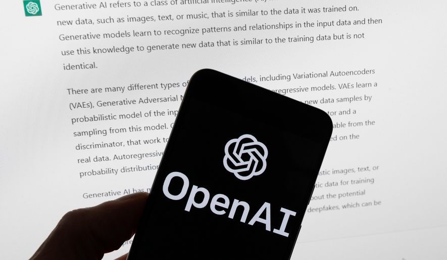 FILE - The OpenAI logo is displayed on a mobile phone in front of a computer screen with output from ChatGPT, March 21, 2023, in Boston. (AP Photo/Michael Dwyer, File)