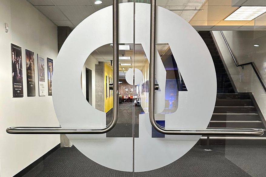 An entrance to the Arizona PBS offices in the Walter Cronkite School of Journalism and Mass Communication in Phoenix is seen, May 2, 2025. (AP Photo/Katie Oyan, File)