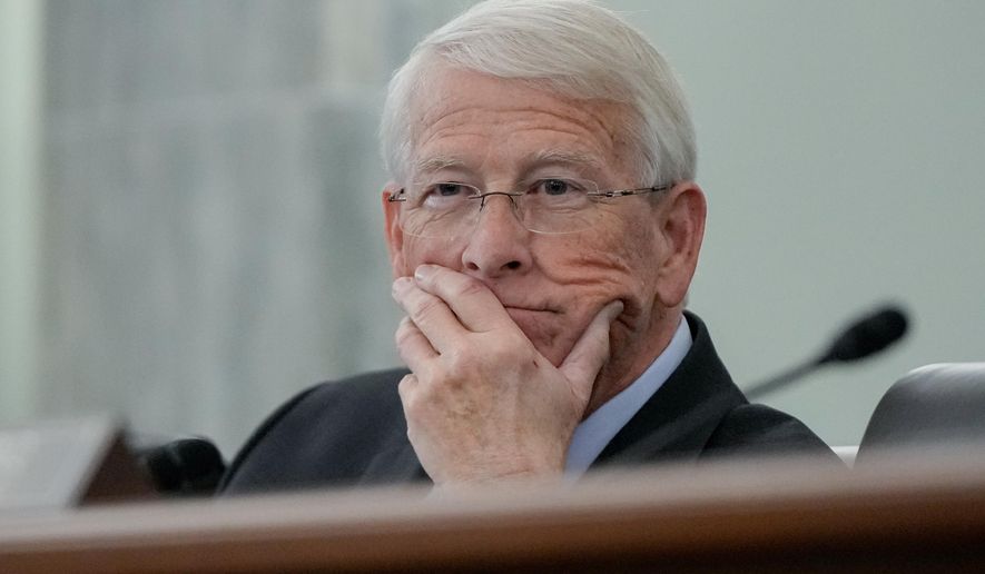Sen. Roger Wicker, R-Miss., listens during a Senate Commerce, Science and Transportation Committee hearing on the nomination of Adm. Kevin Lunday, acting commandant of the U.S. Coast Guard, for Commandant of the Coast Guard, Wednesday, Nov. 19, 2025, on Capitol Hill in Washington. (AP Photo/Julia Demaree Nikhinson)