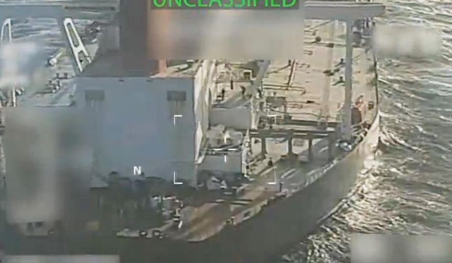 This image from video posted on Attorney General Pam Bondi's X account, and partially redacted by the source, shows an oil tanker being seized by U.S. forces off the coast of Venezuela, Wednesday, Dec. 10, 2025. (U.S. Attorney General's Office/X via AP)