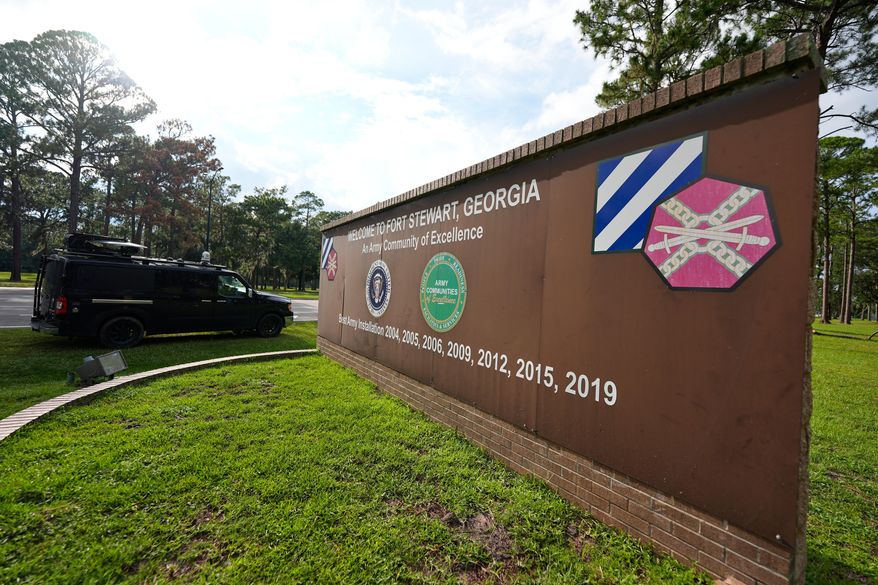 A sign welcoming people to Fort Stewart in Georgia is seen on Wednesday, Aug. 6, 2025. (AP Photo/Mike Stewart, File)