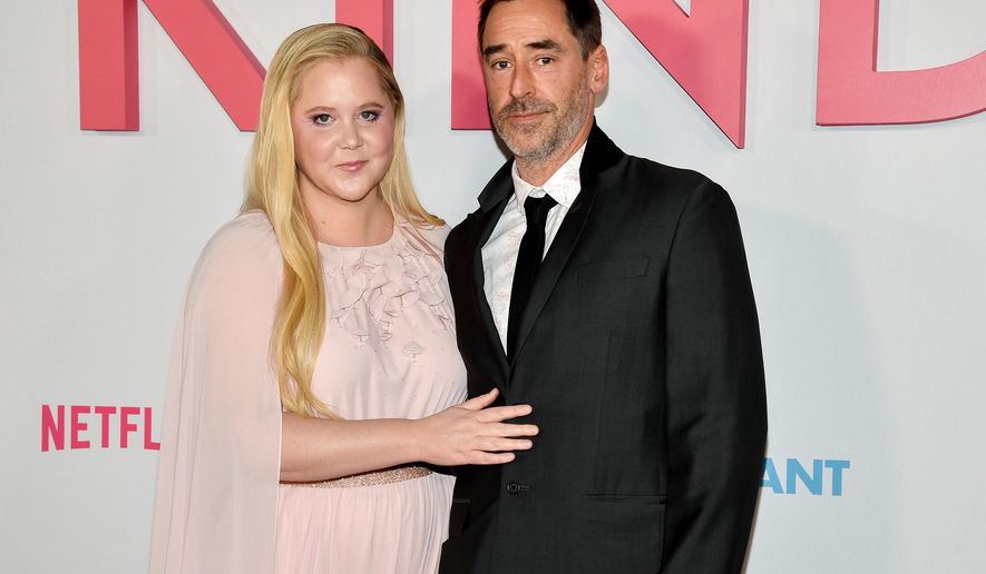 Amy Schumer and husband Chris Fischer attend the premiere of Netflix's "Kinda Pregnant" at The Plaza Hotel in New York, Feb. 3, 2025. (Photo by Evan Agostini/Invision/AP File)