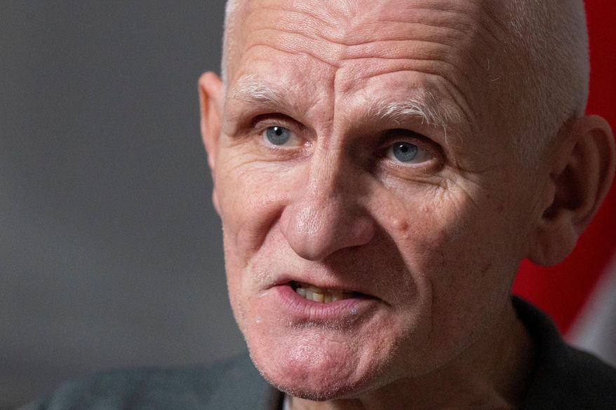 Nobel Peace Prize laureate Ales Bialiatski, one of the Belarusian prisoners released on Saturday, speaks during an interview with the Associated Press in Vilnius, Lithuania, on Sunday, Dec. 14, 2025. (AP Photo/Mindaugas Kulbis)