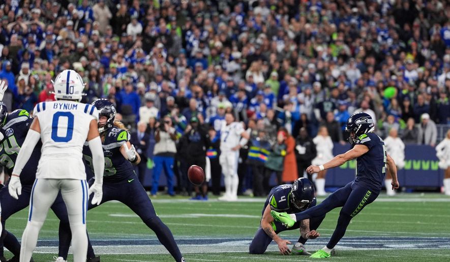 Seattle Seahawks place-kicker Jason Myers (5) kicks the game-winning field goal during the second half of an NFL football game against the Indianapolis Colts, Sunday, Dec. 14, 2025, in Seattle. (AP Photo/Lindsey Wasson)