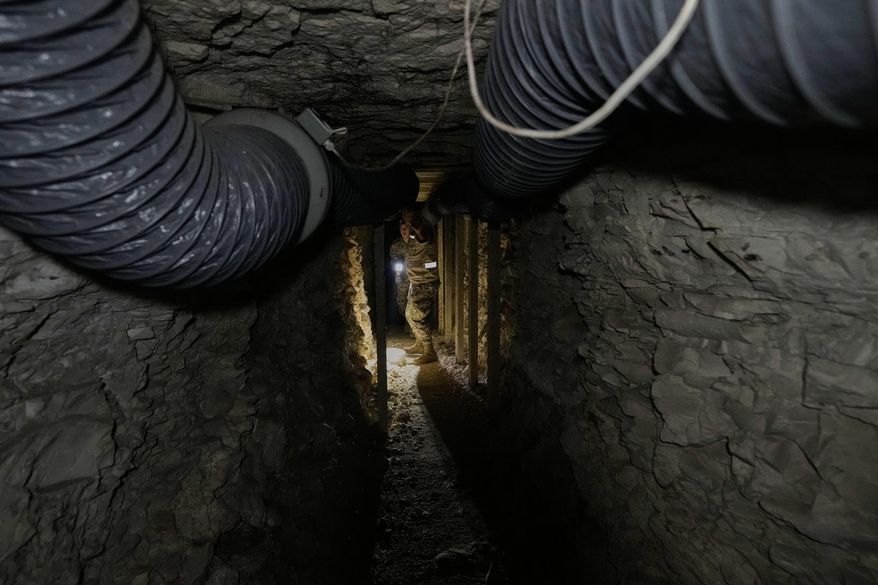 FILE - Lebanese army soldiers walk through a tunnel dug into a mountain that was used by Hezbollah militants as a clinic and storage facility near the Lebanese-Israeli border in the Zibqin Valley, southern Lebanon, Nov. 28, 2025. (AP Photo/Bilal Hussein, File)