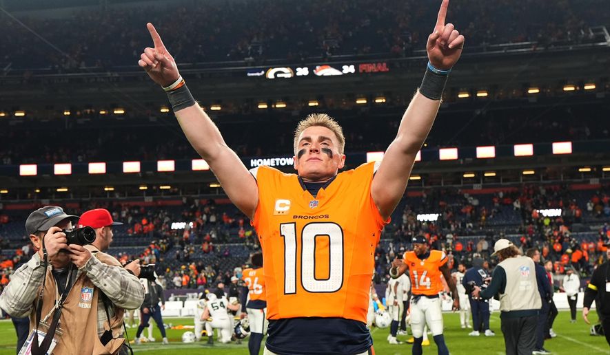 Denver Broncos' Bo Nix celebrates after an NFL football game against the Green Bay Packers Sunday, Dec. 14, 2025, in Denver. (AP Photo/Jack Dempsey)