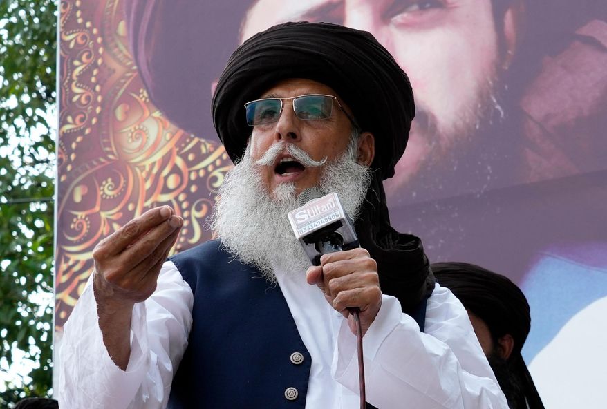 FILE - Zaheerul Hassan Shah, the deputy chief of a radical Islamist party, speaks to his supporters during a gathering in Lahore, Pakistan, July 28, 2024. (AP Photo/K.M. Chaudary, File)