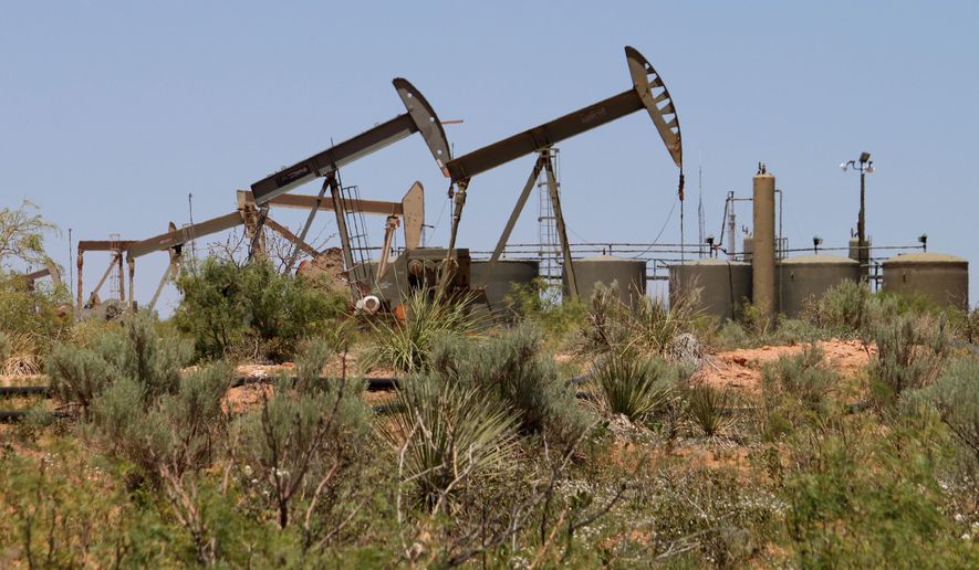 Pump jacks operate in the Permian Basin east of Carlsbad, N.M., on Tuesday, May 20, 2025. (AP Photo/Susan Montoya Bryan, File)