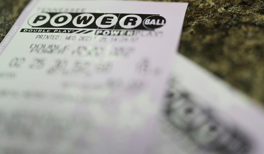 Powerball lottery tickets are seen Wednesday, Dec. 17, 2025, in Nashville, Tenn. (AP Photo/George Walker IV)