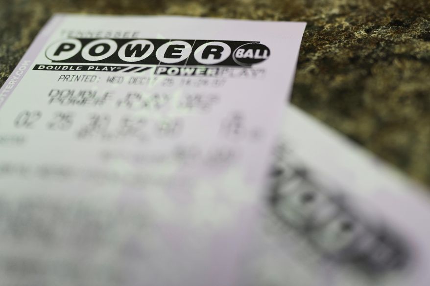 Powerball lottery tickets are seen Wednesday, Dec. 17, 2025, in Nashville, Tenn. (AP Photo/George Walker IV)