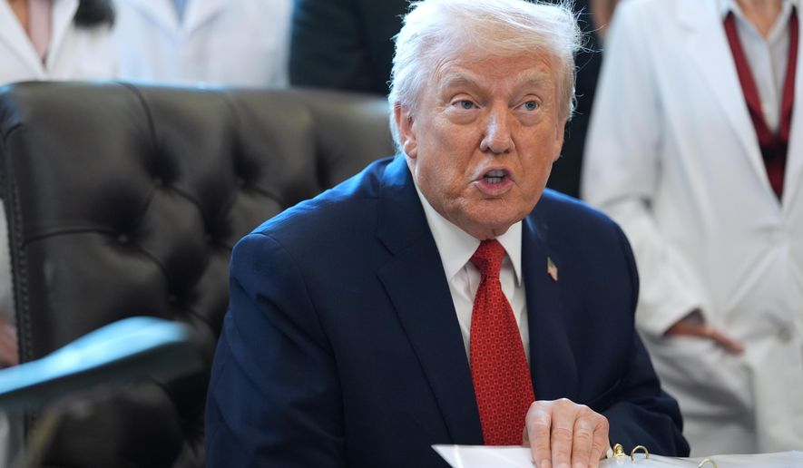 President Donald Trump speaks during an executive order signing in the Oval Office of the White House, Thursday, Dec. 18, 2025, in Washington. (AP Photo/Evan Vucci)