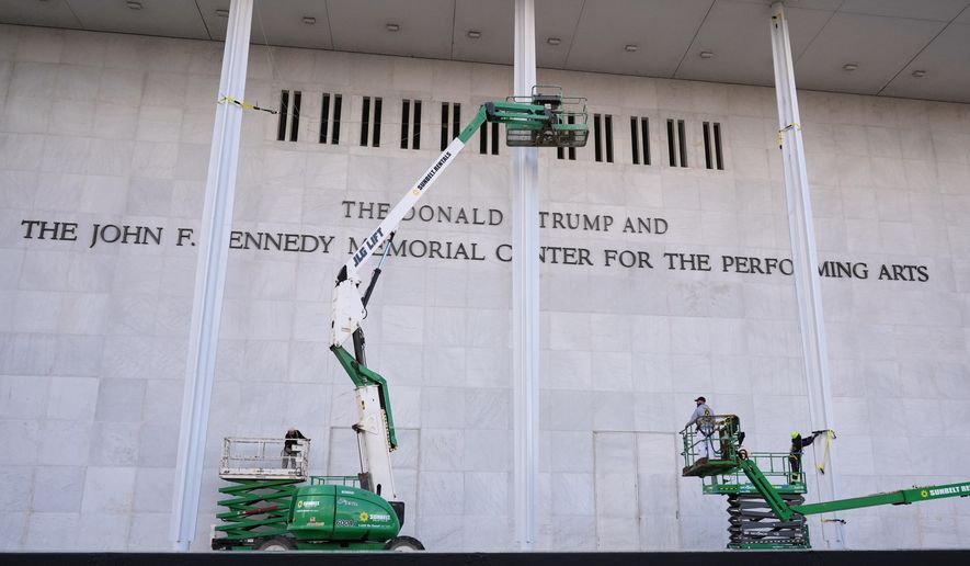 New signage, The Donald J. Trump and The John F. Kennedy Memorial Center for the Performing Arts, is unveiled on the Kennedy Center, Friday, Dec. 19, 2025, in Washington. (AP Photo/Jacquelyn Martin)